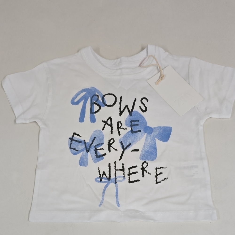 ZARA White T-Shirt with Blue Bow Design